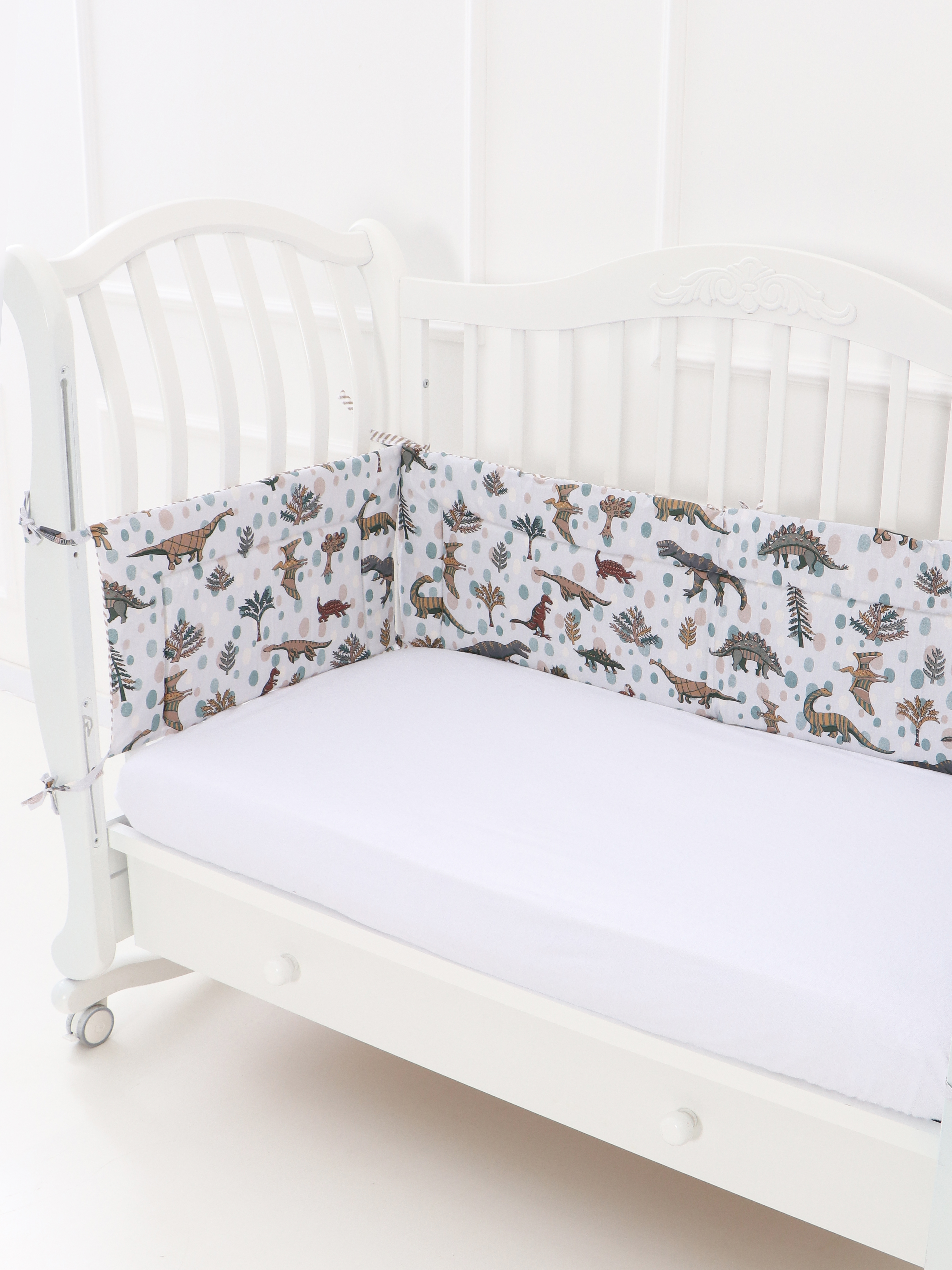 картинка Бортик в детскую кроватку "Дино" БРК-35/дино от магазина Одежда+
